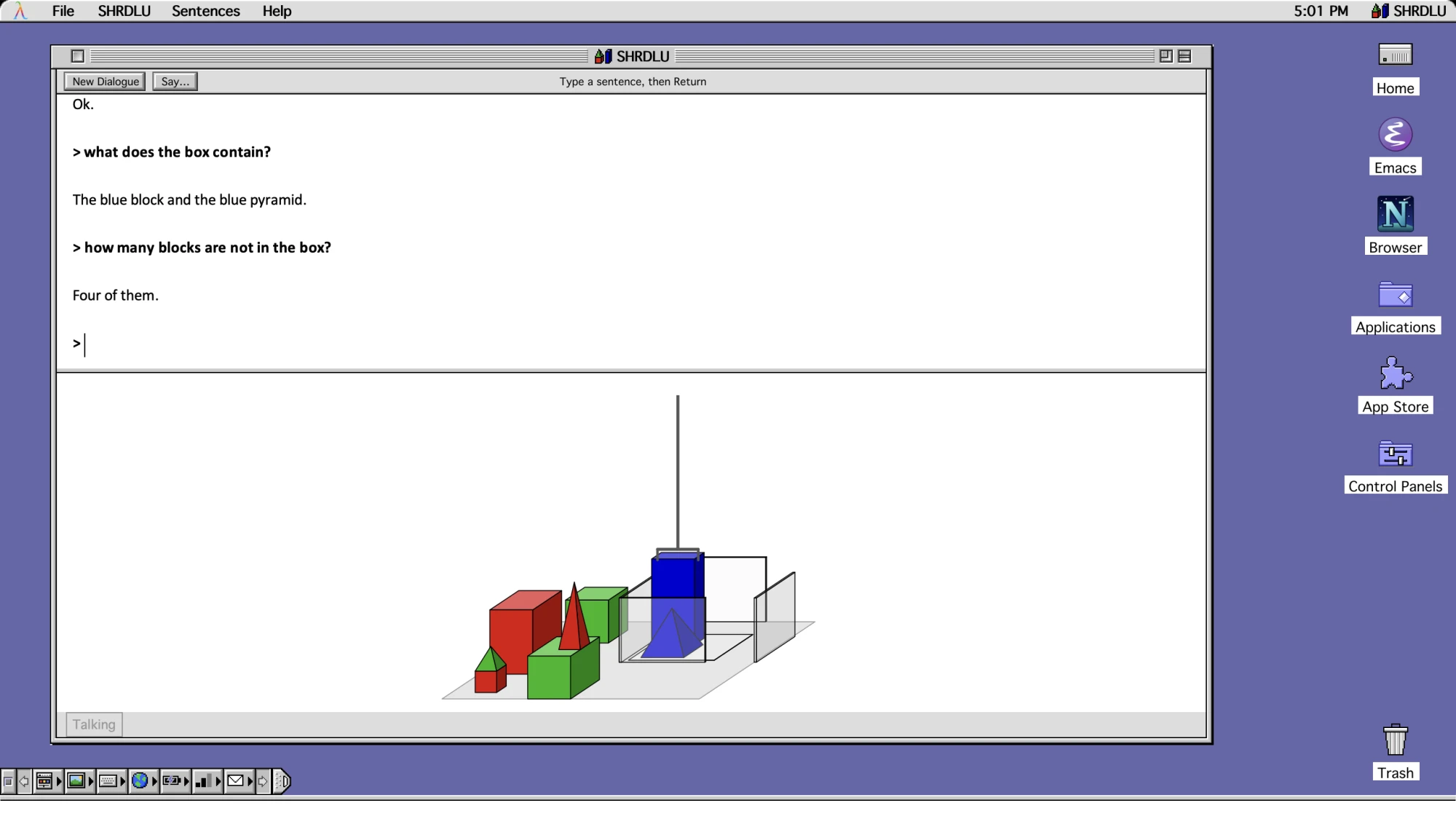 The SHRDLU window. The dialogue on top, a drawing of the table below, with the hand putting a blue block into the box.